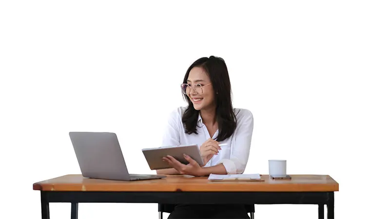 professional woman reviewing life insurance investment Philippines plans on a laptop