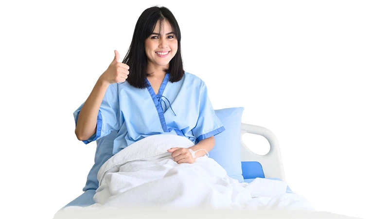 Woman in hospital bed with accident insurance Philippines protection
