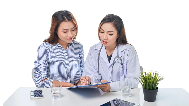 Specialist discussing third party administration program in health insurance Philippines