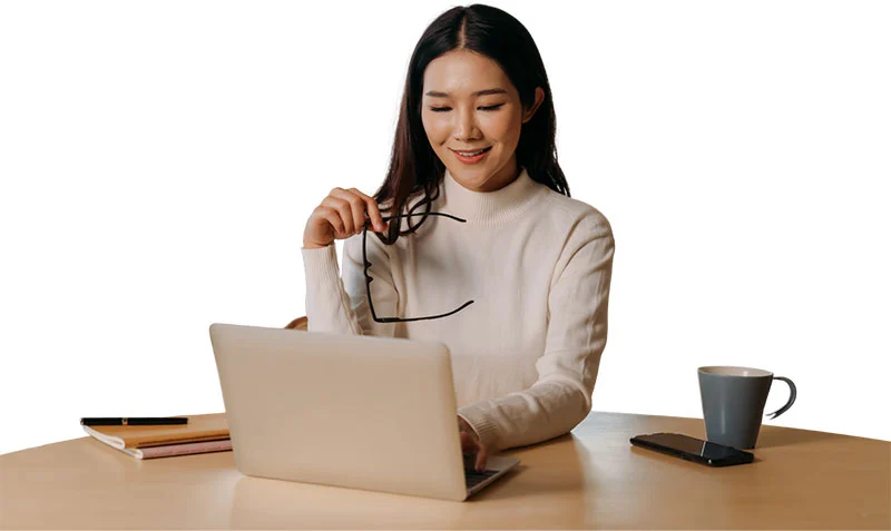 Woman with a laptop using Cocolife LifeMax endowment insurance in the Philippines