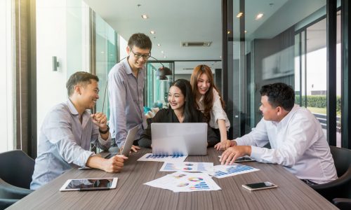 Group Of AsianBusiness people with casual suit working and brainstorming with happy action and celebrate in the modern Office, people business group concept